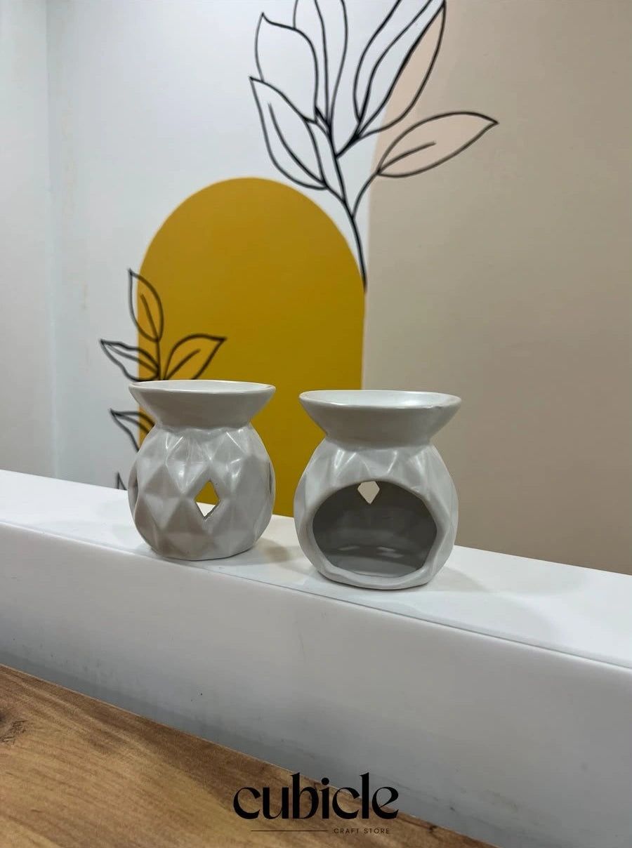 Geometric ceramic oil burner with diamond cut-out design - Cubicle LB